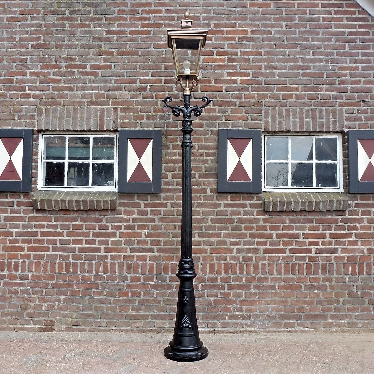 E77. Rotterdammer + krul ladder + koper kap 4k 70. Hoogte: 272 cm
